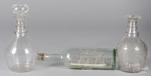 Ship in bottle whimsey, together with two decanters
