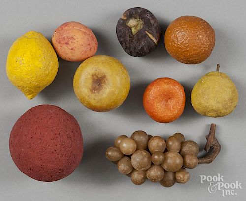 Nine pieces of stone fruit.