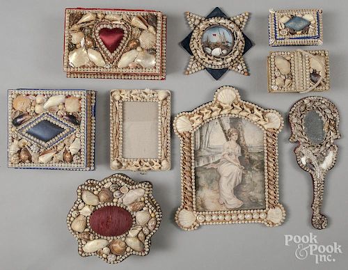Collection of shell art dresser boxes and mirrors.
