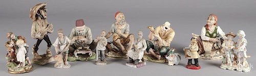 Group of eleven porcelain and bisque figures.
