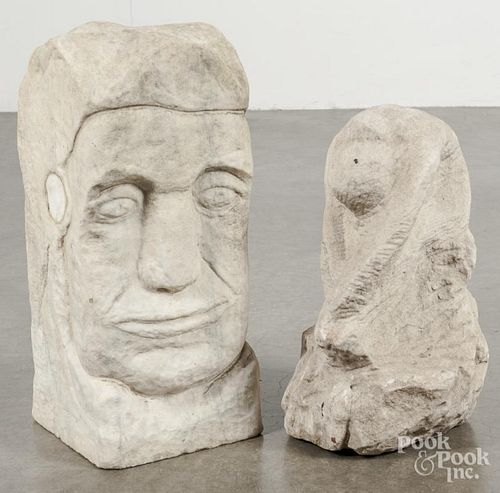Two carved stone figures