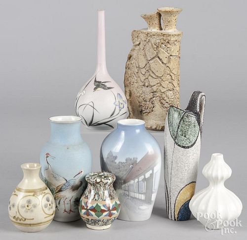Eight pottery and porcelain vases