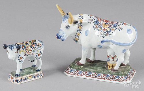 Two faince pottery cows