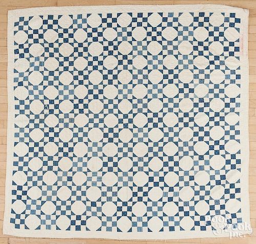 Blue and white snowball quilt