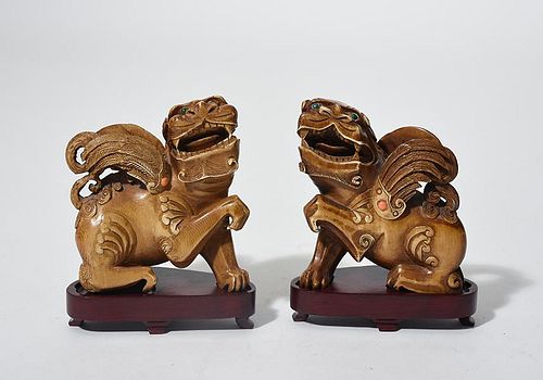 Pair of Chinese carved & jeweled ivory foo lions