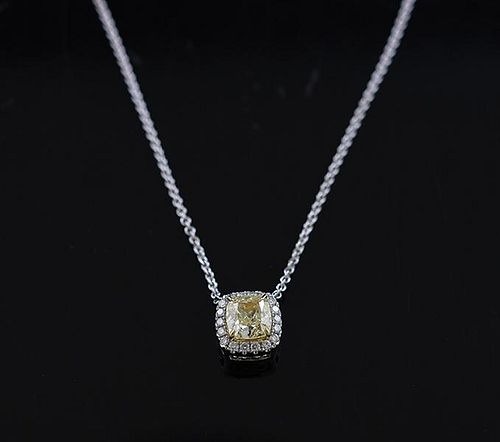 Fancy yellow diamond pendant