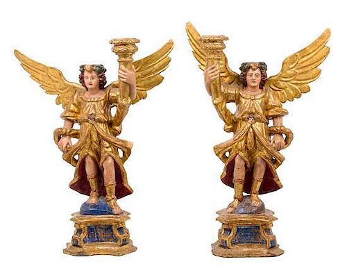 * A Pair of Italian Painted and Gilt Figural Candlesticks Height 28 1/2 inches.