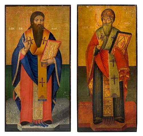 A Pair of Eastern European Ecclesiastical Painted Panels Height 37 x width 17 1/2 inches.
