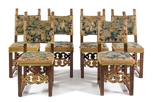 * A Set of Six Italian Baroque Parcel Gilt Walnut Side Chairs Height 44 3/4 inches.