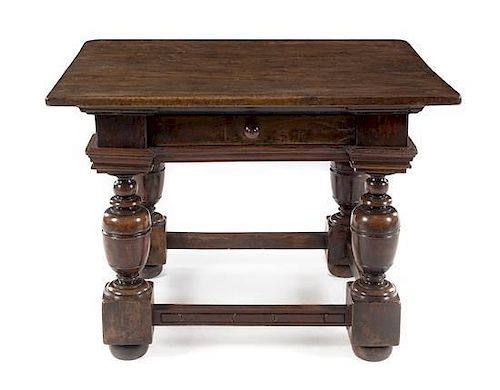 An Italian Renaissance Walnut Table Height 31 3/4 x width 42 1/2 x depth 34 1/2 inches.