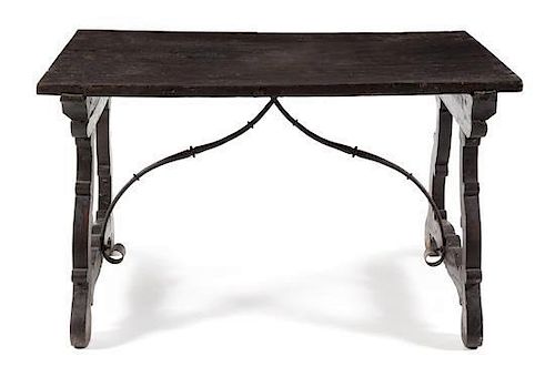 * A Spanish Baroque Walnut Trestle Table Height 32 1/2 x width 54 x depth 36 1/2 inches.