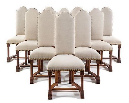A Set of Fourteen Continental Oak Dining Chairs Height 45 3/4 inches.