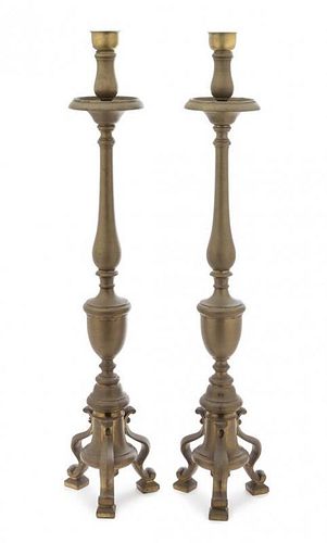 * A Pair of Baroque Style Brass Pricket Sticks Height overall 37 inches.