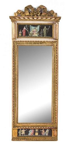 An Italian Neoclassical Giltwood and Verre Eglomise Pier Mirror Height 61 3/4 x width 23 1/2 inches.