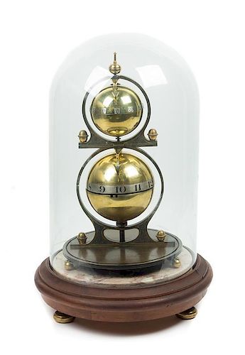 A Gustave Jeager Double Globe Patent Clock Height overall 17 1/2 inches.