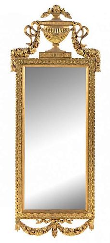 A Gustavian Giltwood Pier Mirror Height 68 1/2 x width 26 3/4 inches.