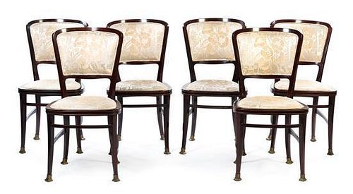 A Set of Six Brass Mounted Mahogany Dining Chairs Height 35 1/2 inches.