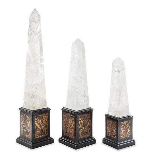 A Set of Three Graduated Rock Crystal and Boulle Marquetry Obelisks Height of tallest 26 1/2 inches.