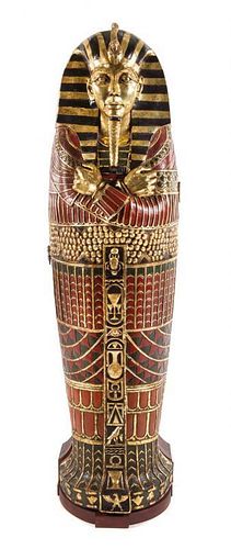 An Egyptian Style Painted Composition Sarcophagus Cabinet Height 74 1/2 inches.