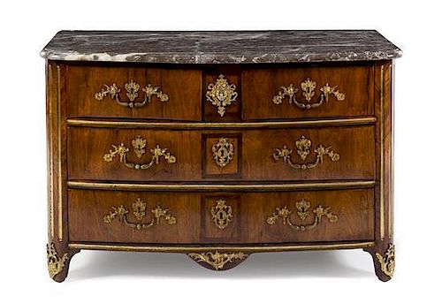 A Regence Style Gilt Metal Mounted Commode Height 31 1/2 x width 48 1/2 x depth 23 inches.