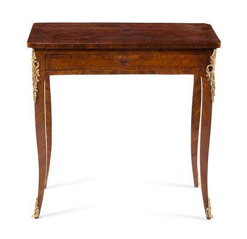 A Louis XV Style Gilt Metal Mounted Tulipwood Side Table Height 27 1/4 x width 15 1/2 x depth 25 3/4 inches.