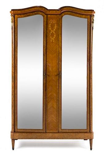 A Louis XVI Style Burlwood Marquetry Armoire Height 90 3/4 x width 52 1/2 x depth 20 1/4 inches.