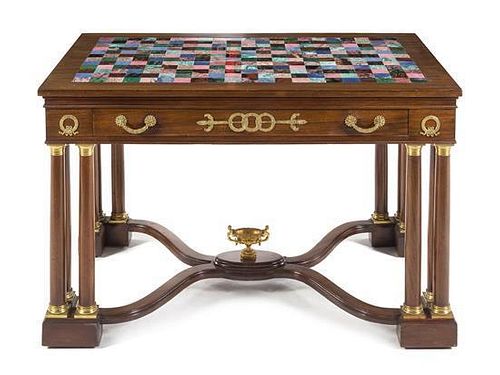 An Empire Style Gilt Bronze and Marble Mounted Mahogany Table Height 30 3/4 x width 48 x depth 30 inches.