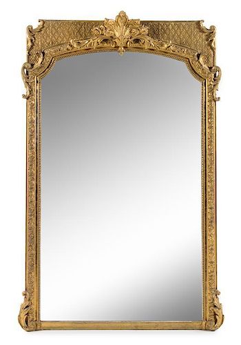 A Napoleon III Giltwood and Composition Mirror Height 75 x width 50 inches.