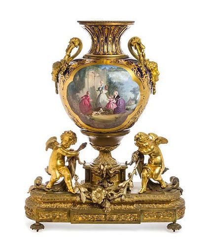 A Sevres Style Gilt Bronze Mounted Porcelain Urn Height 30 1/4 inches.