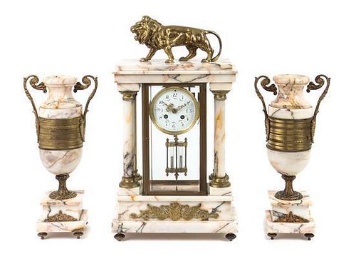 A Continental Gilt Bronze and Marble Clock Garniture Height of mantel clock 20 inches.