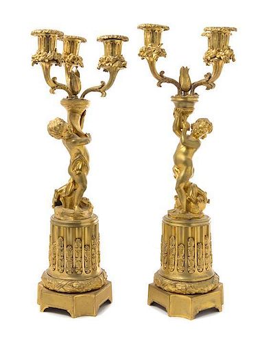 * A Pair of French Gilt Bronze Three-Light Candelabra Height 16 1/2 inches.