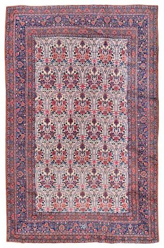 A Tabriz Wool Rug 8 feet 8 inches x 11 feet 7 inches.
