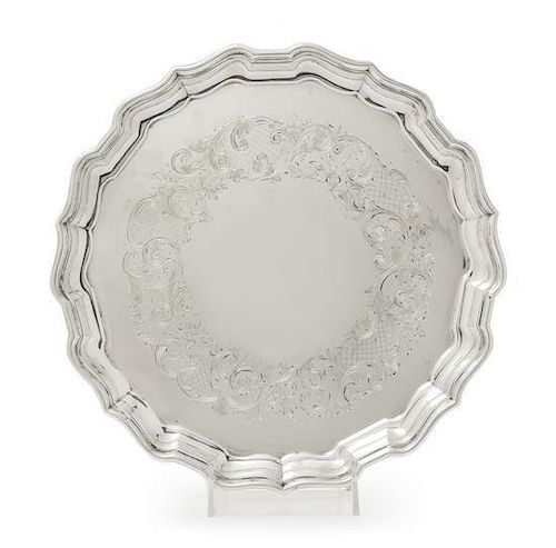 A Canadian Silver Salver, Henry Birks & Sons, Montreal, Quebec, 1939, having a scalloped rim and border, the field with engra