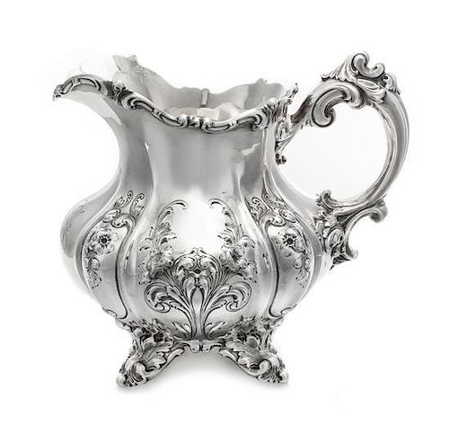 * An American Silver Water Pitcher, Theodore B. Starr, New York, NY, Late 19th/Early 20th Century, the squat, baluster form b