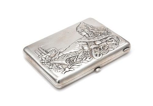 * A Russian Silver Cigarette Case, Maker's Mark Obscured, Moscow, Early 20th Century, the lid worked to show the personificat