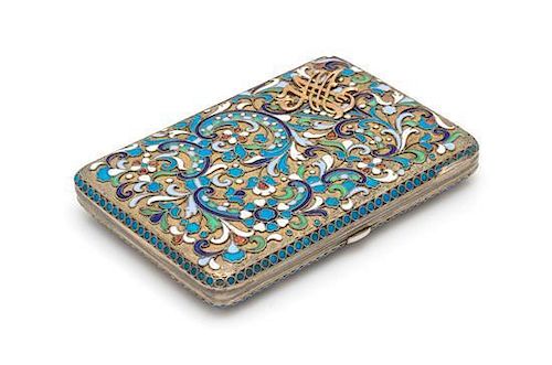 * A Russian Silver-Gilt and Enameled Cigarette Case, Mark of Grigory Sbitnev, Moscow, 19th/20th Century, the case having poly