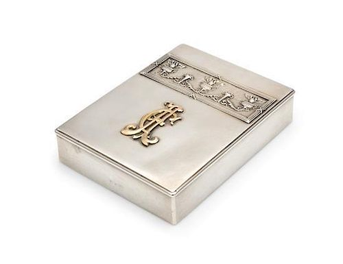 * A Russian Silver Table-Top Cigarette Case, Spurious Faberge Marks Overstriking Another Mark, Late 19th/Early 20th Century, 