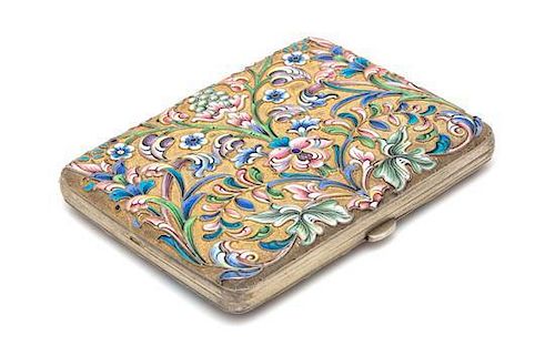 * A Russian Silver-Gilt and Enameled Cigarette Case, Nikolai Zugeryev, Moscow, Early 20th Century, the case with polychrome f
