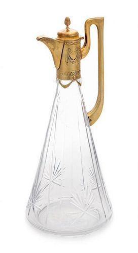 * A Russian Silver-Gilt Mounted Cut Glass Ewer, Mark of Ivan Khlebnikov with Imperial Warrant, Moscow, Late 19th Century, the