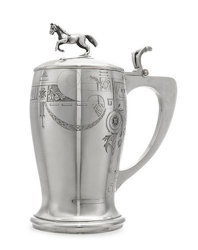 * A Russian Silver Tankard, Mark of the 2nd Artel, Moscow, Early 20th Century, the domed lid with a later horse finial, the b