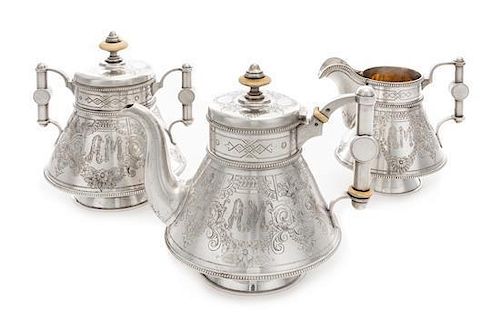 * A Russian Silver Three-Piece Tea Service, Maker's Mark PJS, Assay of Alexander Sevier, St. Petersburg, 1884, comprising a t