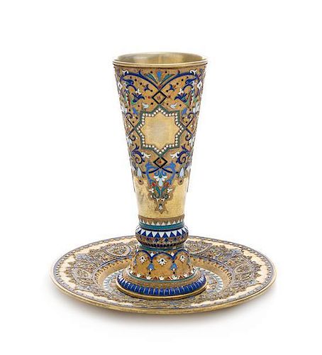 * A Russian Silver-Gilt and Enamel Beaker and Underplate, Mark of Ivan Andreyev, Assay of Viktor Savinsky, Moscow, 1887, the