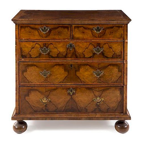 * A William and Mary Style Burl Walnut Chest of Drawers Height 38 x width 39 x depth 21 3/4 inches.