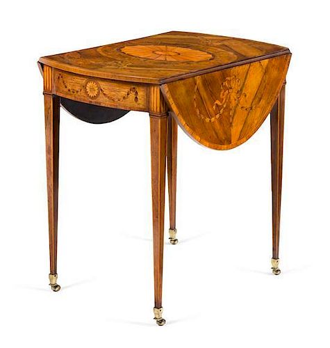 A George III Satinwood, Rosewood and Marquetry Pembroke Table Height 28 1/8 x width 37 (open) x depth 27 1/2 inches.