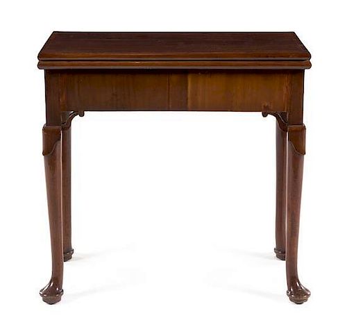 A George III Mahogany Flip-Top Game Table Height 28 3/4 x width 29 x depth 14 3/8 inches (closed).