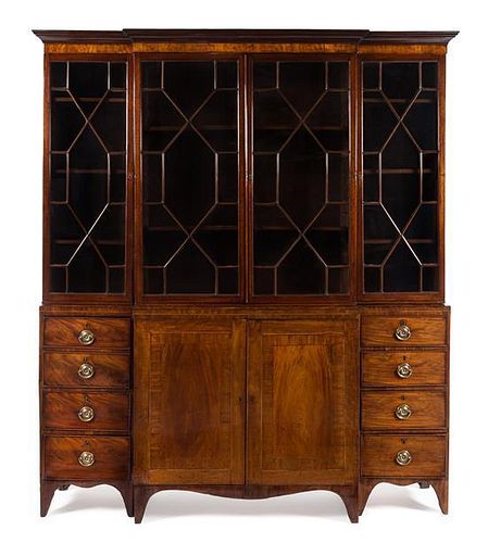 A George III Mahogany Breakfront Bookcase Height 85 3/4 x width 72 1/4 x depth 15 1/4 inches.