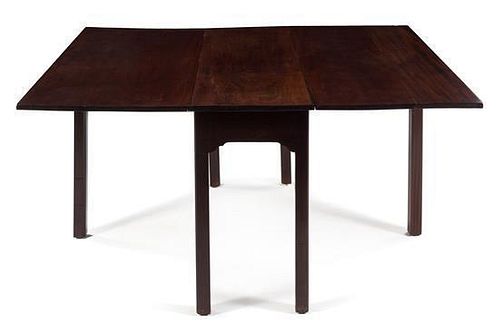A George III Style Mahogany Drop-Leaf Table Height 28 1/2 x width 48 x depth 17 inches (closed).