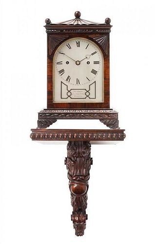 A Regency Rosewood Bracket Clock Height overall 26 1/4 inches.
