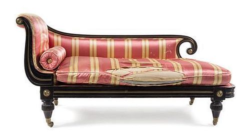 A Regency Brass Mounted Ebonized Chaise Longue Length 67 inches.
