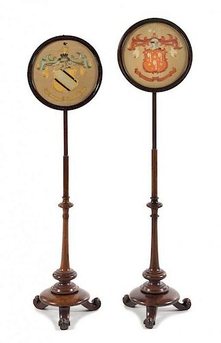 A Pair of Regency Needlework Pole Screens Height of taller example 51 1/2 inches.